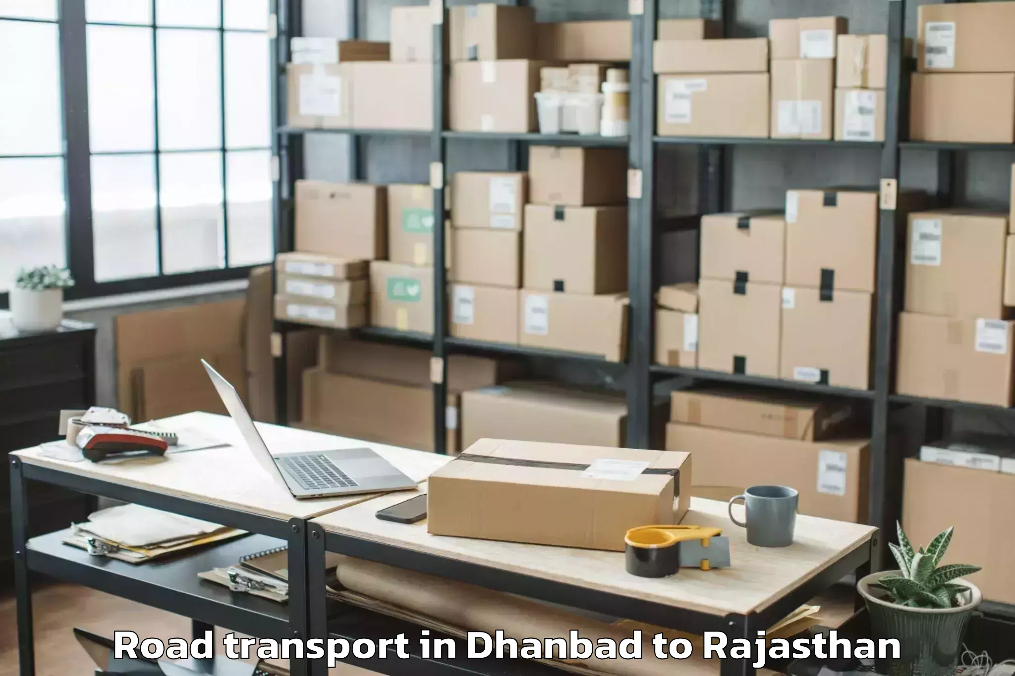 Hassle-Free Dhanbad to Madhav University Pindwara Road Transport